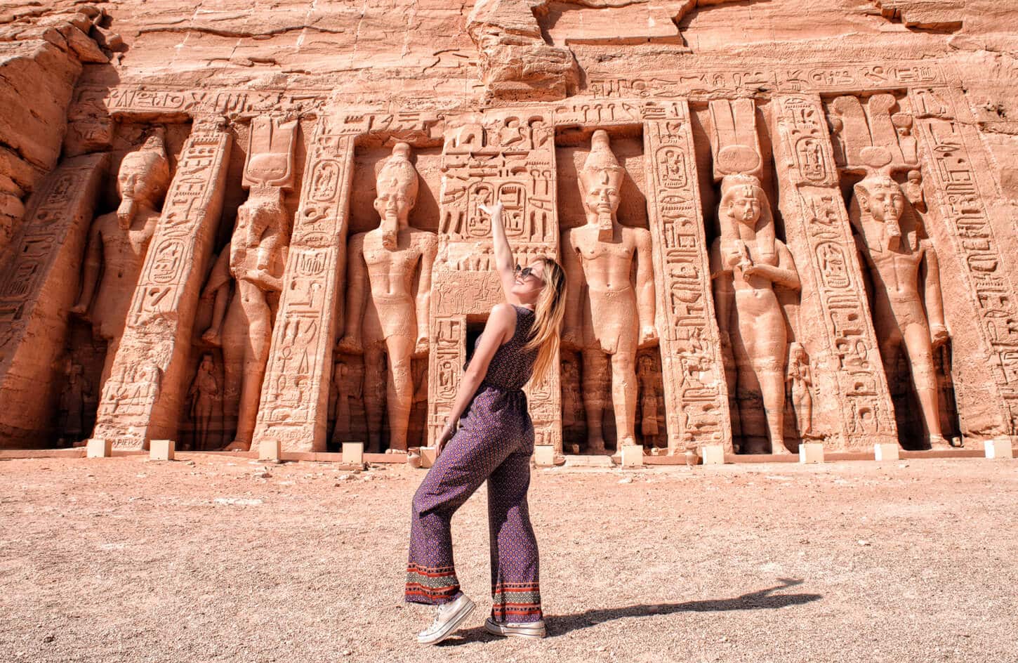 A-girl-in-front-of-the-facade-of-the-small-temple-of-abu-simbel